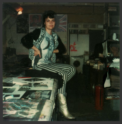 Molly wearing the BREASTS T-shirt in 1977 at John and Molly's studio